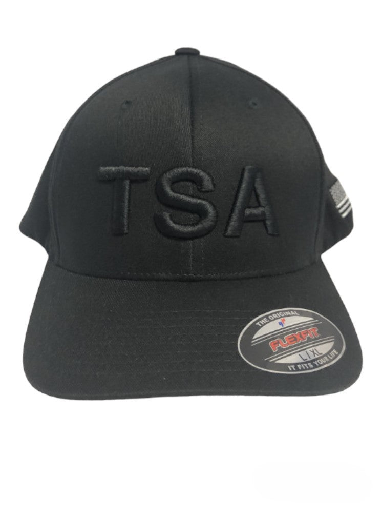 TSA BLACK OUT LETTERS W/ FLAG FLEXFIT HAT-BLACK